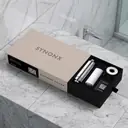 SYNONX Shower Filter box open on marble bathroom counter